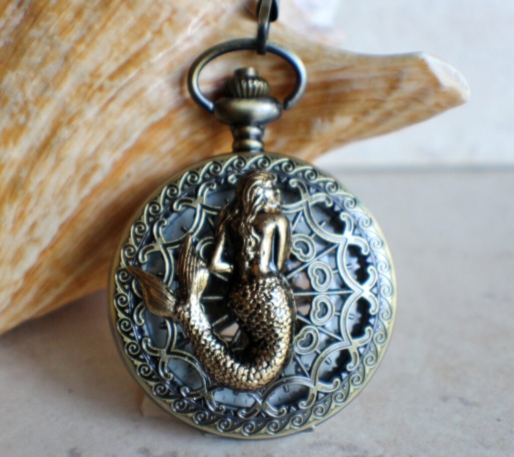 Mermaid pocket watch, men's mechanical pocket watch with mermaid mounted on front cover.