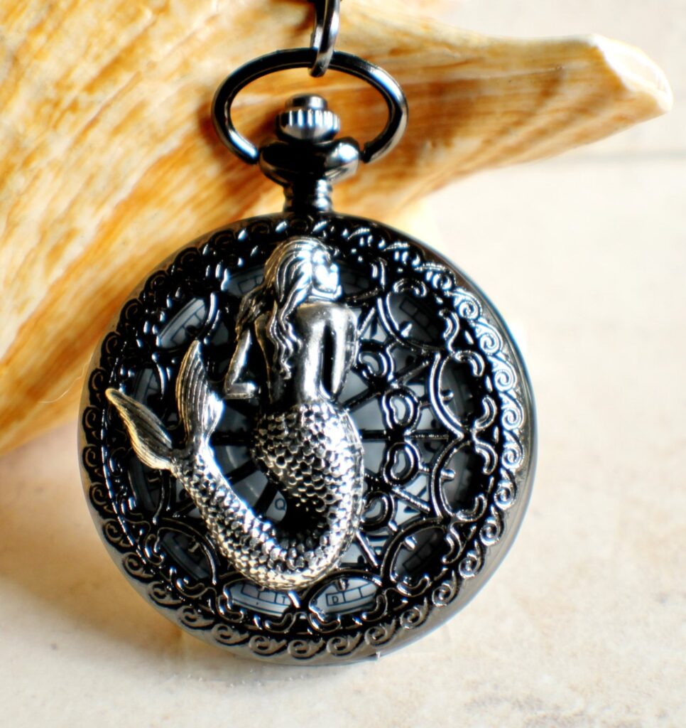 Mermaid battery operated pocket watch.