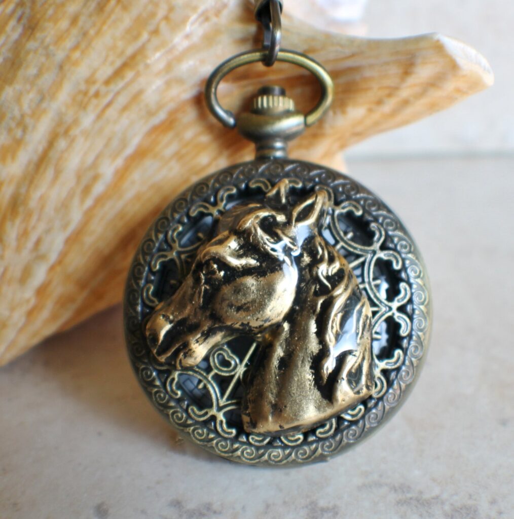 Horse battery operated pocket watch.